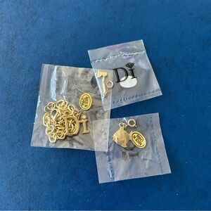 Gold Charm Set with Di Logo